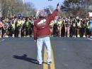 Bob Moran fires the gun to signal the start of the 86th running of the Manchester Road Race, Manchester, November 24, 2022. Photo by Cloe Poisson/Special to the Courant (Cloe Poisson / Special to the Courant)